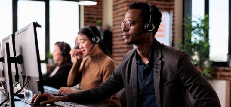 operator-answering-client-phone-call-customer-care-service-helping-people-call-center-support-male-receptionist-giving-telemarketing-assistance-phone-helpline-office (1) operator-answering-client-phone-call-customer-care-service-helping-people-call-center-support-male-receptionist-giving-telemarketing-assistance-phone-helpline-office (1)